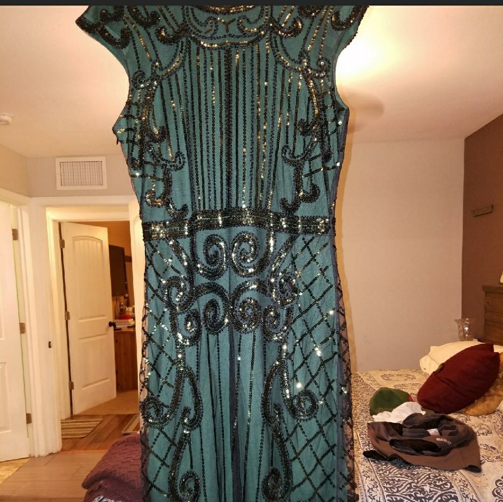 1920s style dress and headband with feather